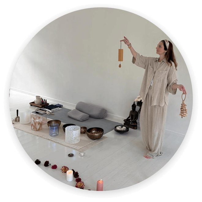 Michèle Gabrielle holding sound instruments in the ceremony room