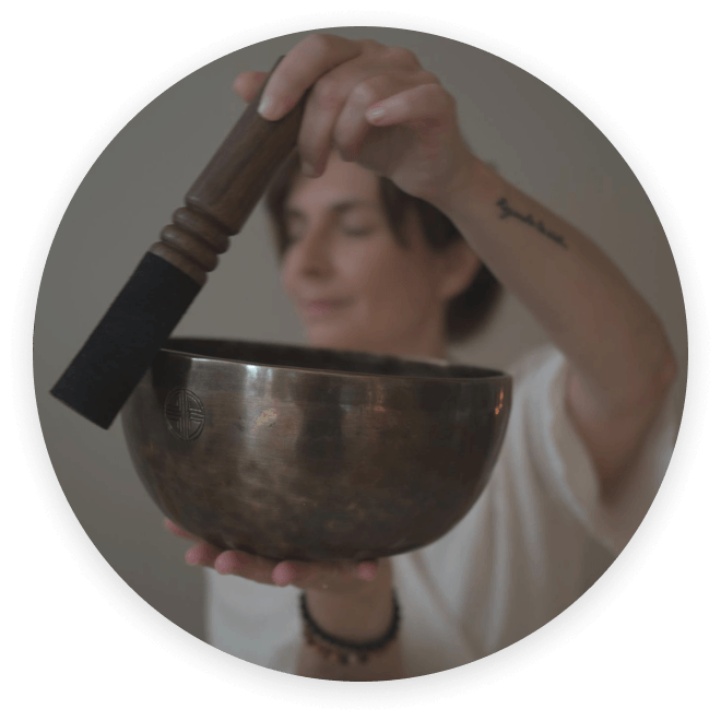 Gabi playing a Himalayan singing bowl
